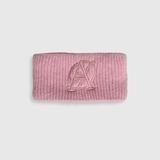 Pink textured pouch with a logo on a light gray background