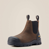 Brown leather boot with black sole on a beige background