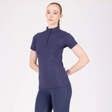 Woman wearing a purple athletic outfit on a white background