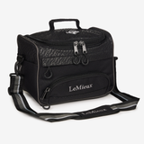 LeMieux AW26 Elite ProKit Lite Grooming Bag Varient Black. A black LeMieux horse tack storage bag with a top handle, front zippered pocket, and an adjustable shoulder strap, shown on a light grey background.