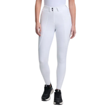 White riding pants worn by a person on a white background