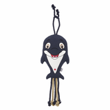 Dolphin shaped horse toy on white background