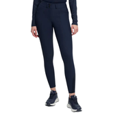 Person wearing navy leggings on a white background