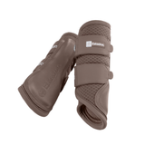 A pair of brown Eskadron horse leg boots shown against a solid white background, displaying both the front strap closure and the side branding.