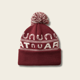 Ariat Ladies Apres Ski Beanie Varient Burgundy. Red and White beanie with large Ariat branding and horse shoe detailing with a red and white pom pom on a light background.