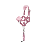 Toy pink pony halter and leadrope on a white background