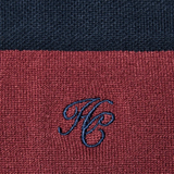 Holland Cooper Riding Sock Variant Oxblood Navy. A material patch in dark red and navy with HC embroided
