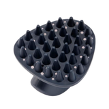 LeMieux AW26 Massage Brush Varient Navy. A dark gray silicone massage brush head with multiple conical nubs and small circular holes, shown on a plain white background.