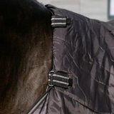 Close up of a horse rug with a detachable neck.
