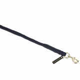 Navy blue braided leather dog leash with gold clasp on a white background