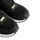 Close-up of black training shoes on a white background