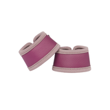 LeMieux AW26 Toy Pony Over Reach Boots Variant Colour Blackberry. A pair of toy pony leg wraps in blackberry colour with beige trim on white background.