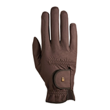 Mocha riding glove with a small gold logo on a velcro strap shown on a white background.