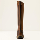 A tall brown leather riding boot shown from the back, featuring a central black zipper, brown leather panels, and a rugged brown and black sole, set against a plain off-white background.