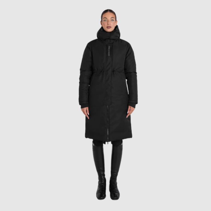 Person wearing a black coat on a white background