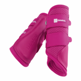 Two pink Eskadron horse leg boots shown on a clean white background, displaying different angles of the protective boots.