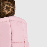 Hood of a pink puffer jacket with logo on a white background