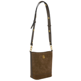 Holland Cooper Country Crossbody Bag Variant Colour Linchen Suede.
A brown suede shoulder bag with a matching adjustable shoulder strap, accented by gold-tone hardware and a small gold crest logo on the front.