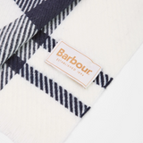 Close-up of a Barbour branded product with a checkered pattern