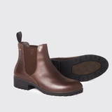 Mahogany brown leather Chelsea boots on a light grey background