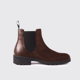 Brown Chelsea boot on a light grey background