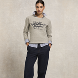 Woman wears the Holland Cooper Country Club Crew Sweat in Grit Marl with a blue and white pinstripe shirt