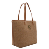 light brown herringbone tote bag with HC gold harware logo on white background