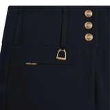 Close-up of dark blue trousers with gold buttons and a decorative patch.