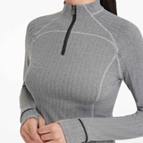 Grey long-sleeve base layer with a quarter zip on a white background
