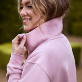 Close up to the neck detail of the LeMieux Ladies Kiera Quarter Neck in Blossom