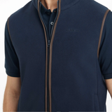 Navy blue short-sleeve gilet with brown zipper on a white background