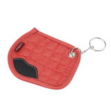 Red quilted saddle pad with a keychain on a white background