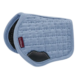 Blue quilted saddle pad with a visible brand logo on a white background