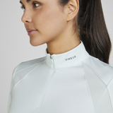 Logo collar detail of the Pikeur Sports Mesh Long Sleeve Baselayer in Ice Blue