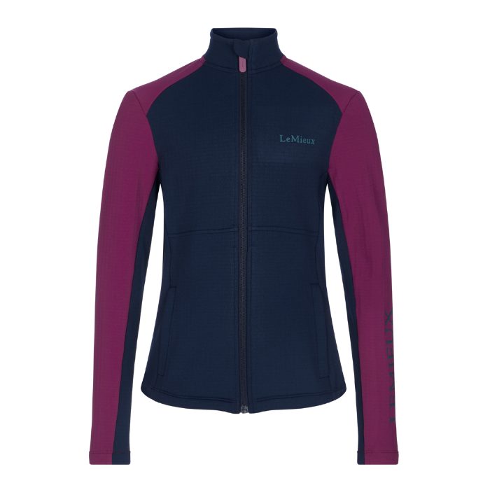 LeMieux AW26 Young Rider Bethany Fleece Zip Through Varient Blackberry. A women's full-zip jacket by LeMieux, featuring a dark navy blue body and magenta-purple raglan sleeves and side panels, with the brand name 'LeMieux' printed on the left chest and sleeve.