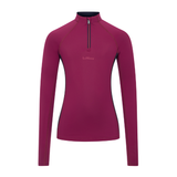 LeMieux AW26 Young Rider Classique Base Layer Variant Colour Blackberry.
A women's long-sleeve quarter-zip athletic top in a deep magenta-purple color, featuring a small 'LeMieux' logo on the left chest and dark piping details, shown on a plain white background.
