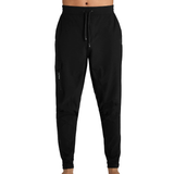 Male figure whereing black training pants white background