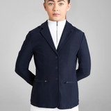 Person wearing a navy blue blazer over a white shirt on a grey background