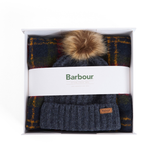 Plaid blanket with knit beanie and pom-pom in a Barbour branded box.