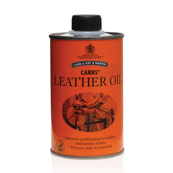 Carr & Day & Martin leather oil can on a white background