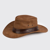 Brown leather hat with a brown band on a light grey background