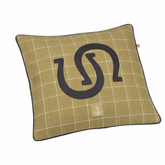 Checkered pillow with a horseshoe symbol on a white background