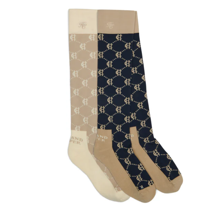 Two pairs of socks with HC jacquard detailing on a white background