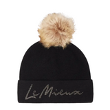 Black beanie with a fur pom-pom and 'Le Mieux' branding on a white background
