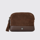 Brown suede coin purse with a tassel on a light grey background
