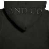Black hoodie with 'HOLLAND COOPER' text on the hood against a white background