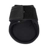 Black protective horse boot on a white background