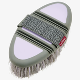 Grooming brush with bristles and a patterned handle on a white background