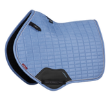 Blue quilted saddle pad with black accents on a white background