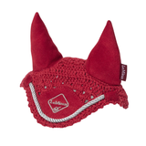 Red ear bonnet with decorative elements on a white background